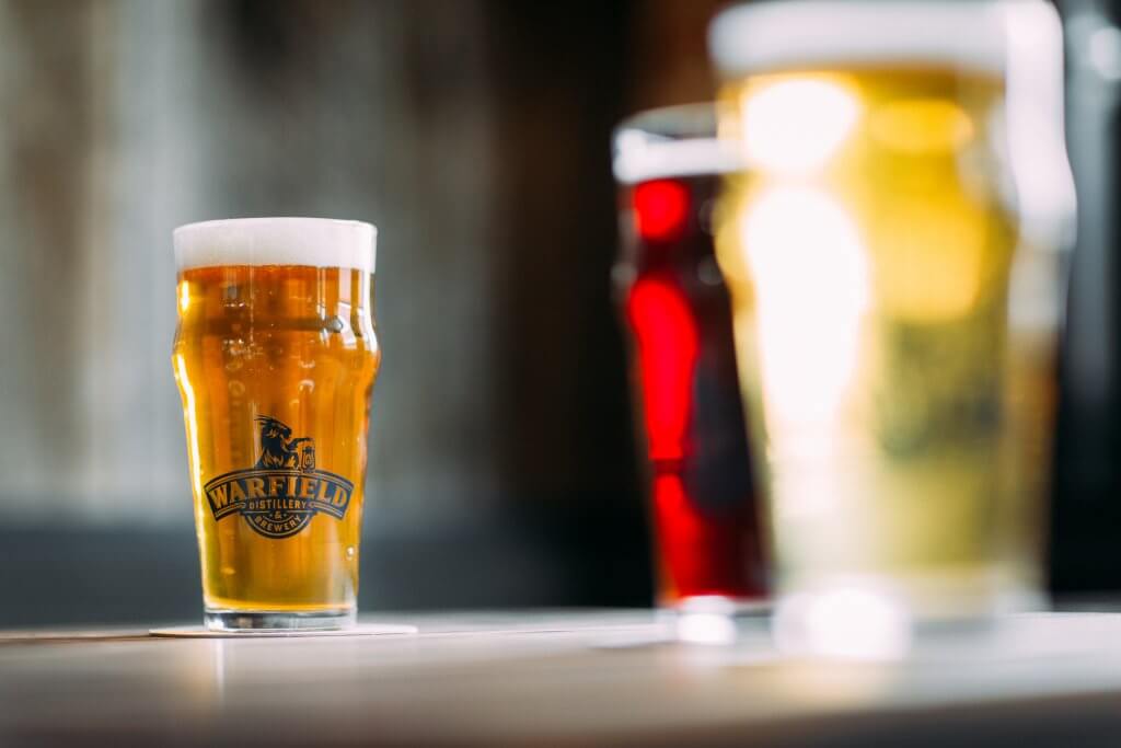 Close shot of Warfield Brewery brews on a bar.