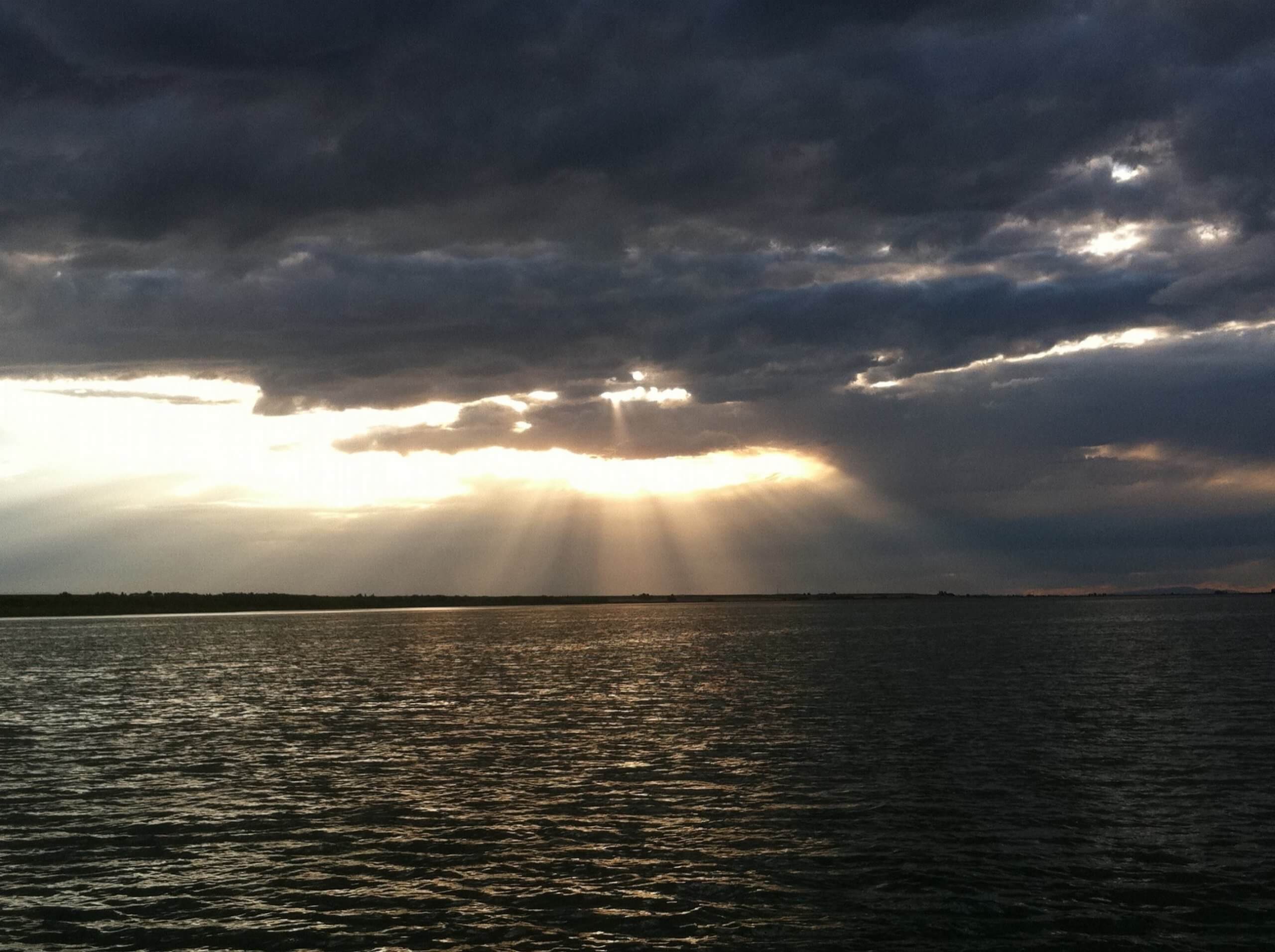 CLOUDS OVER A LAKE