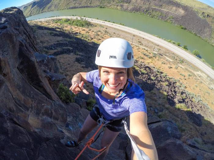 woman rock climbing