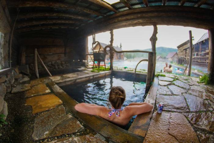 woman soaking in hot spring