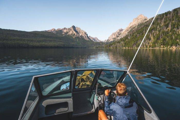 person driving boat