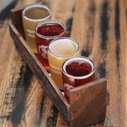 A beer flight on a table at White Dog Brewing Co.