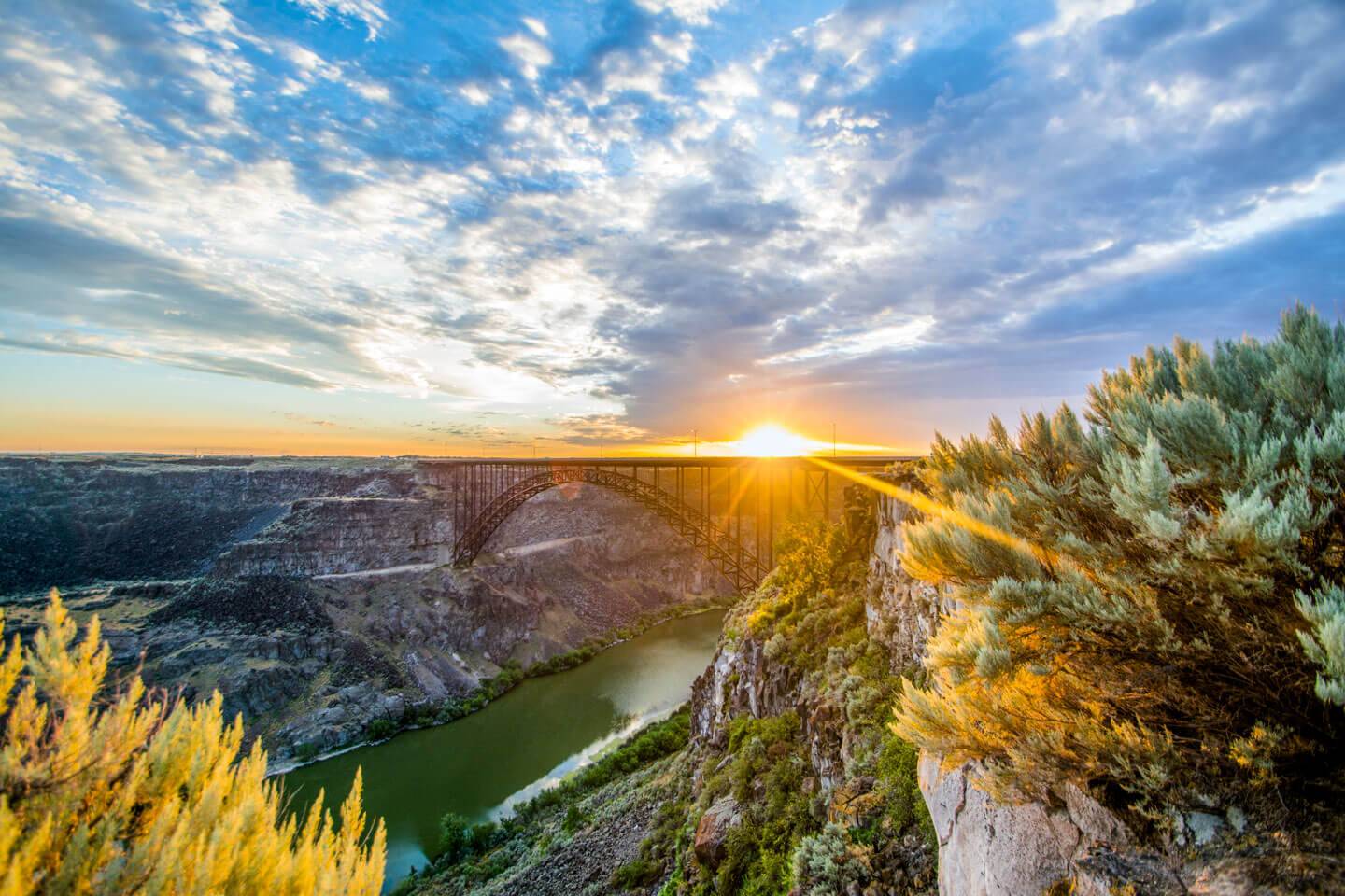 The sun sets over the Perrine Memorial Bridge overlooking the Twin Falls.