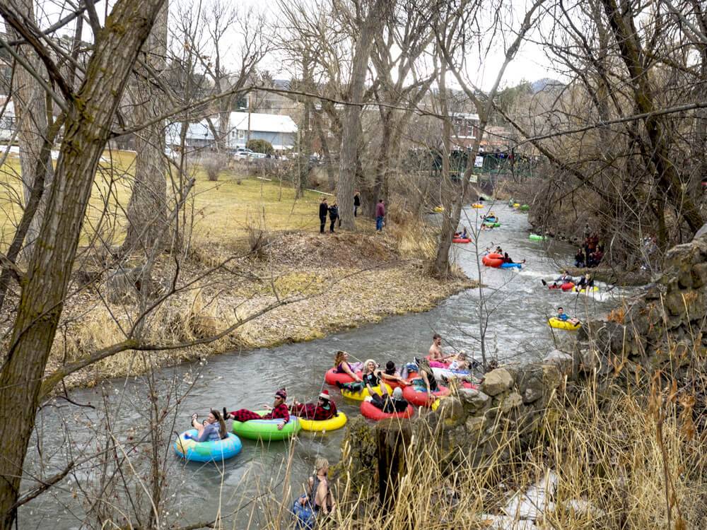 people floating a river