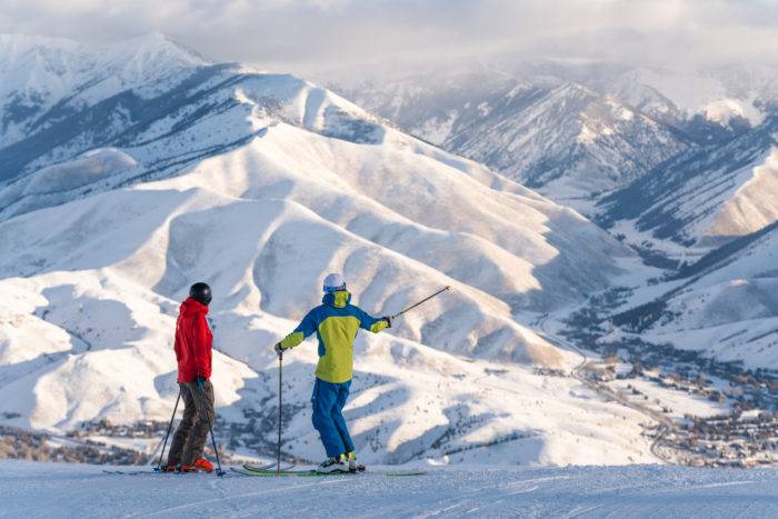 two skiers