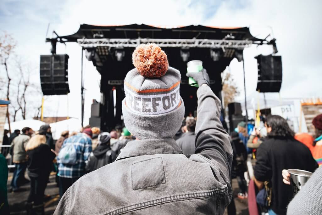 man at outdoor concert stage