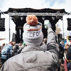 man at outdoor concert stage