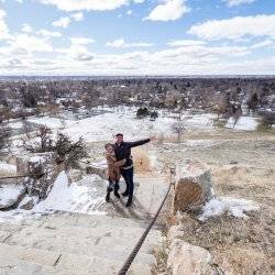 people standing on top of a hill