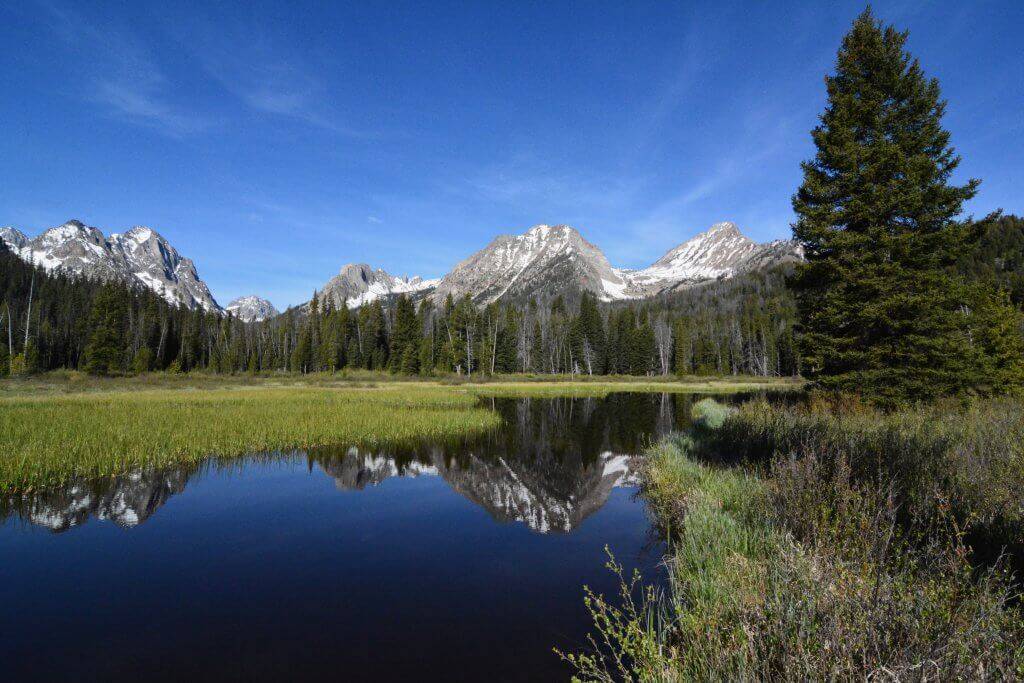 mountain reflection in still lake