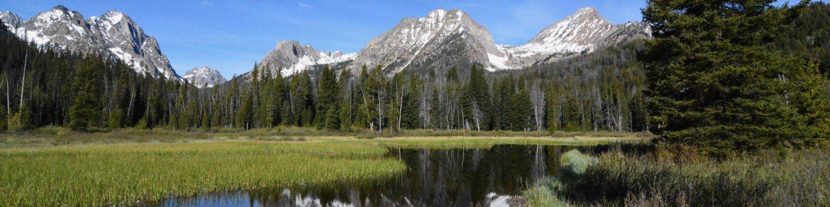 mountain reflection in still lake