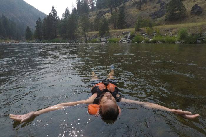 woman floating in river