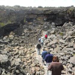 people hiking in the shoshone ice caves.