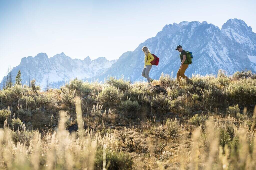 two people hike on marshall ridge near stanley