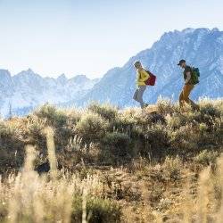 two people hike on marshall ridge near stanley