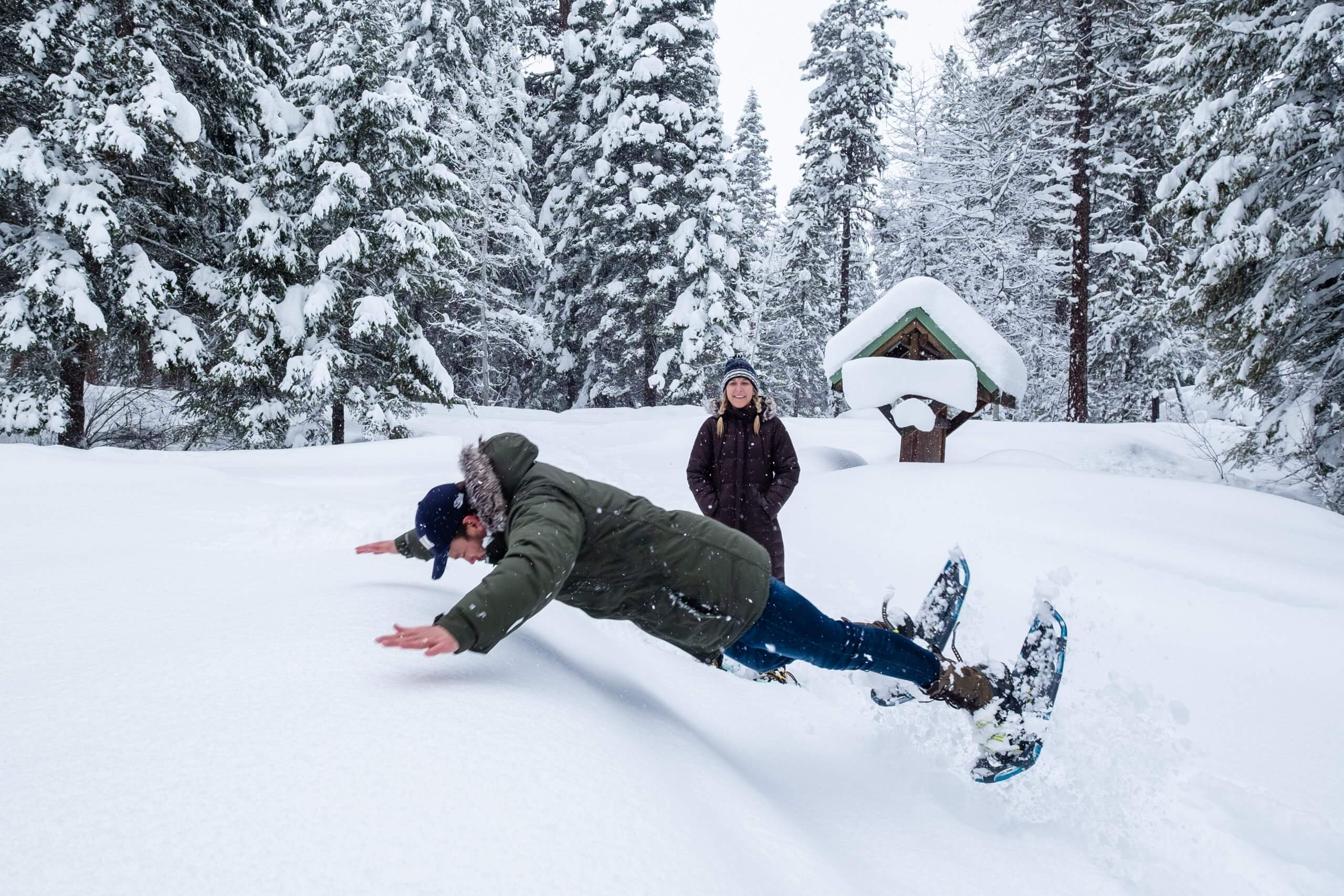 man jumping in snow