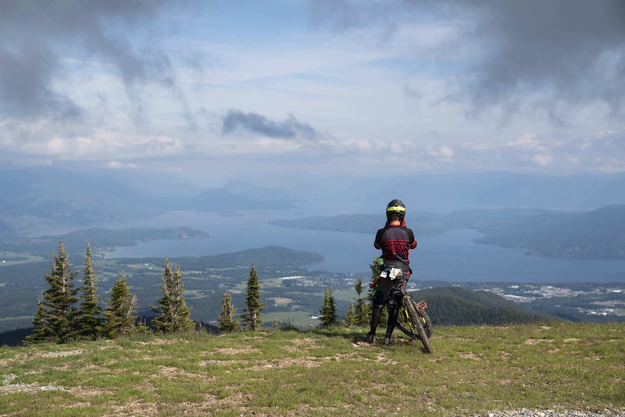 Taking in the view while mountain biking at Schweitzer Mountain Resort.