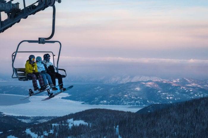 skiers on a chair lift