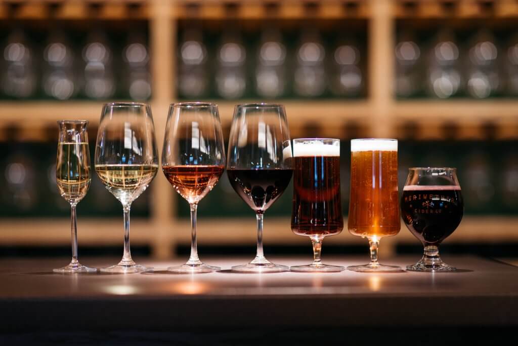 variety of wine glasses with drinks