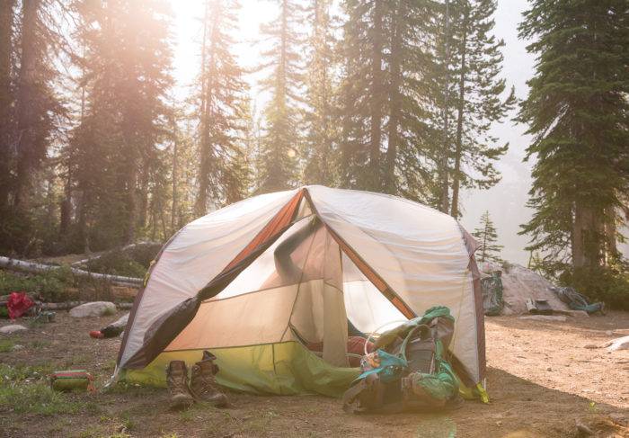 person tent camping