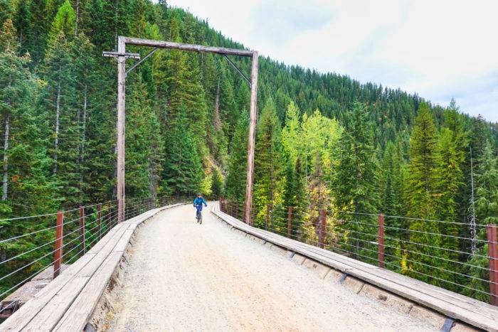 cyclist on mountain trail 