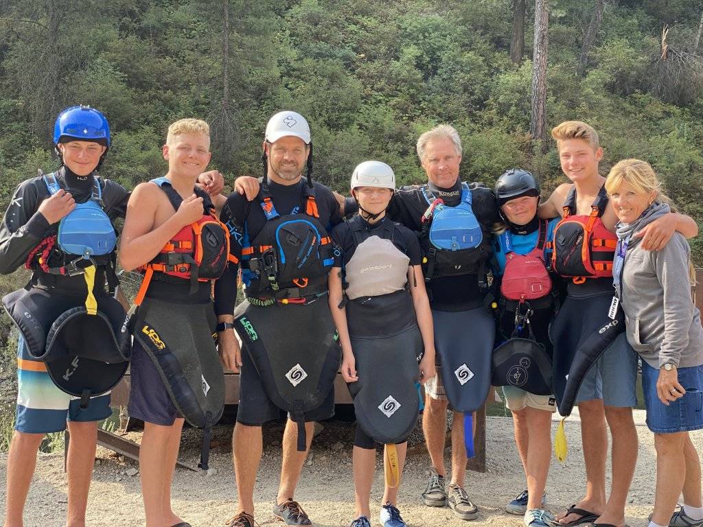 8 members of the Long Family smiling for the camera