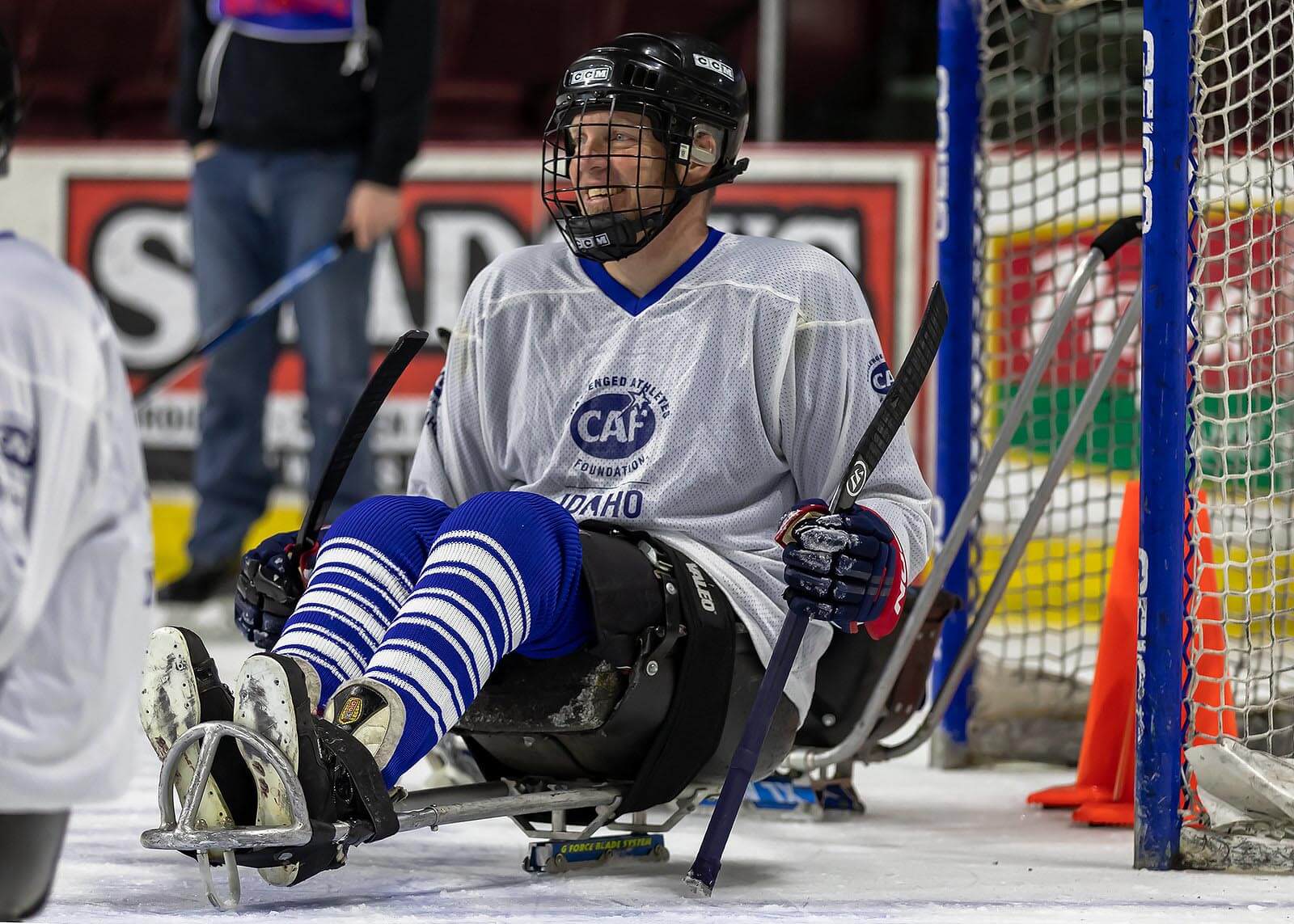 Sean Halstead in hockey gear on ice rink.