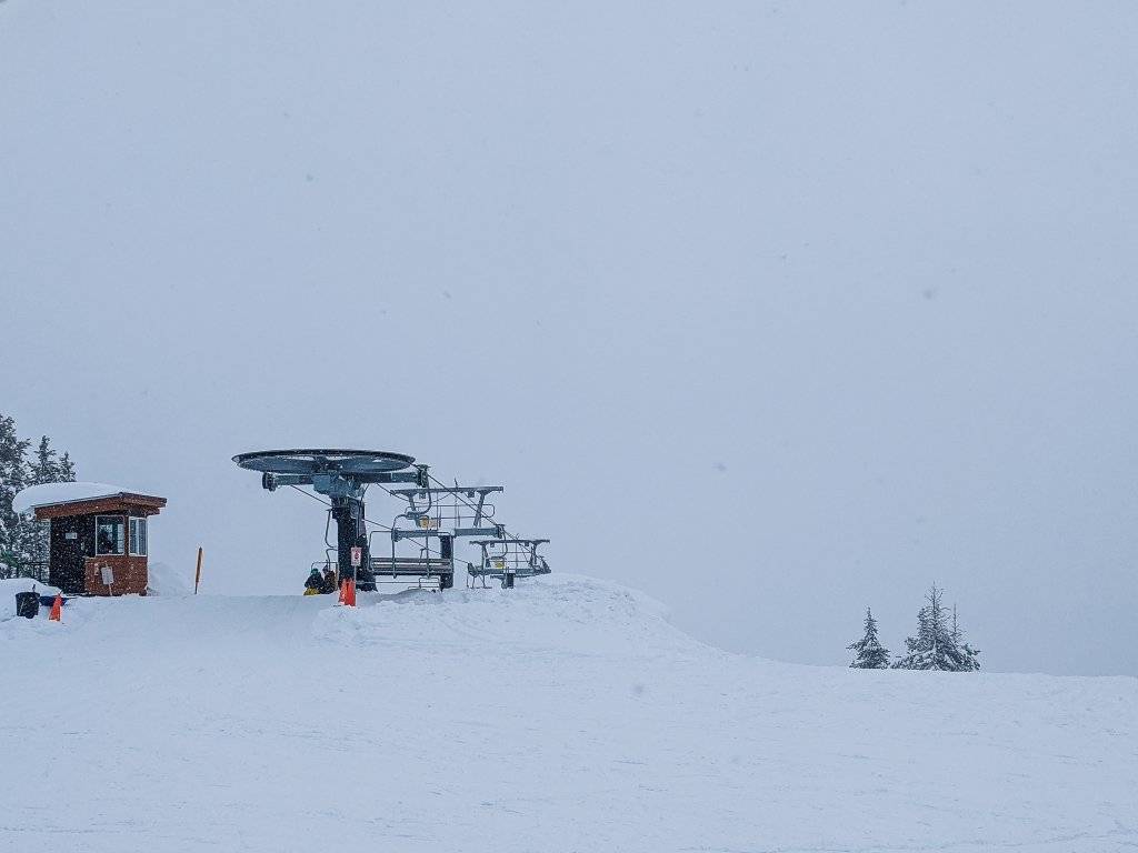 snowy top of lift look out at schweitzer