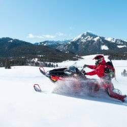 person on snowmobile