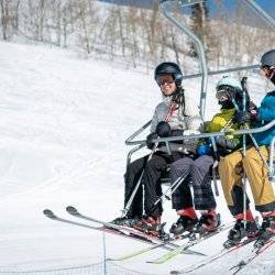 family on ski lift at Pomerelle