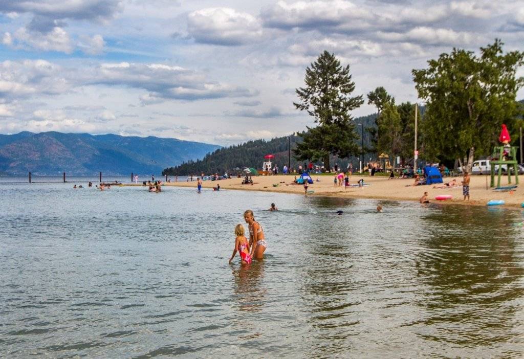 mom and daughter in lake at sandpoint