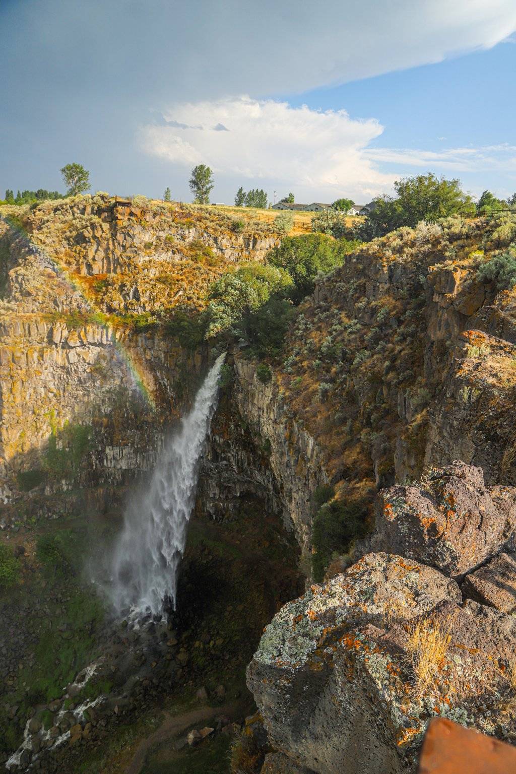 view of waterfall from edge above