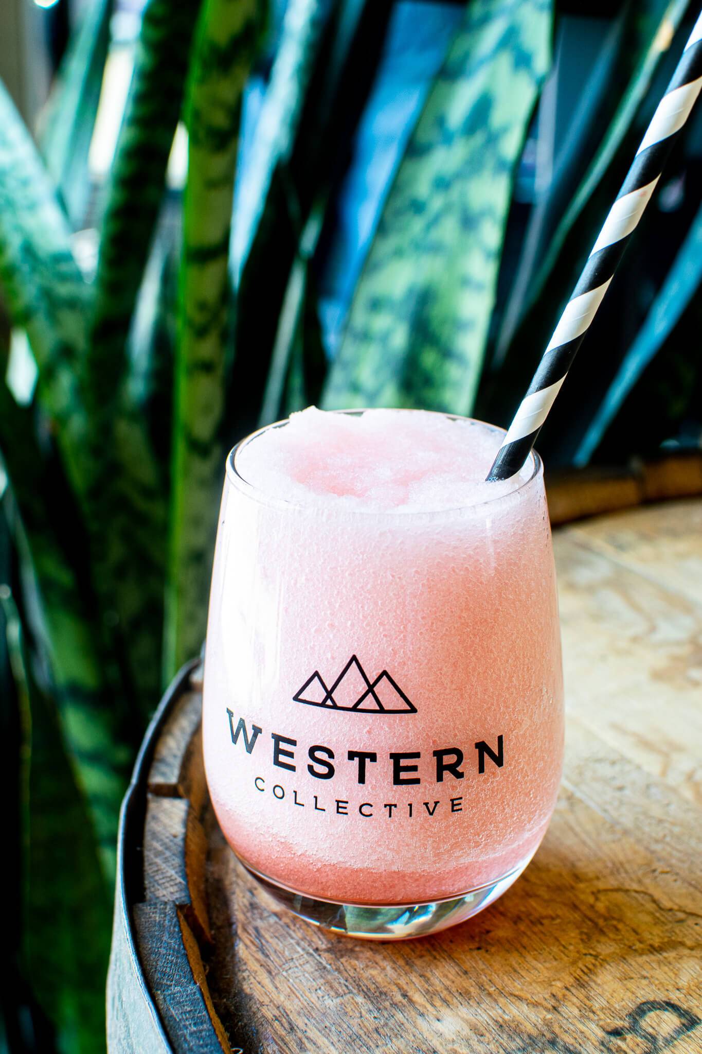 frosé in glass with straw