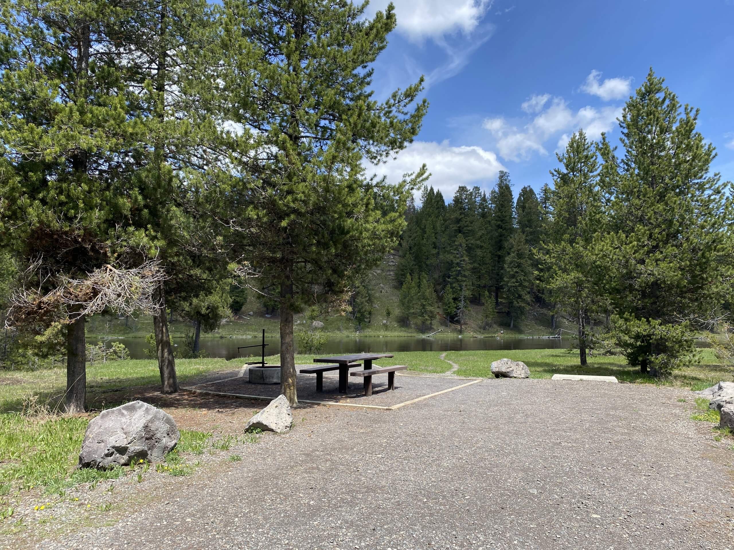 picnic table with river view at developed camp site