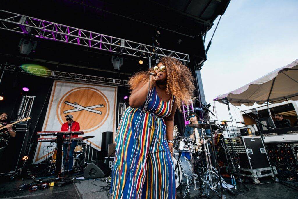 WOMAN SINGING ON TREEFORT MAINSTAGE