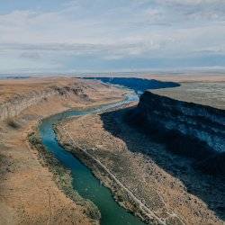 a river winding through a canyon