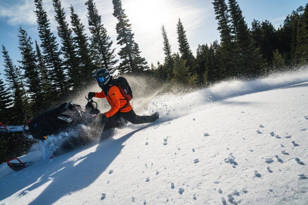 snowmobiler in deep snow in Big Hole Mountains