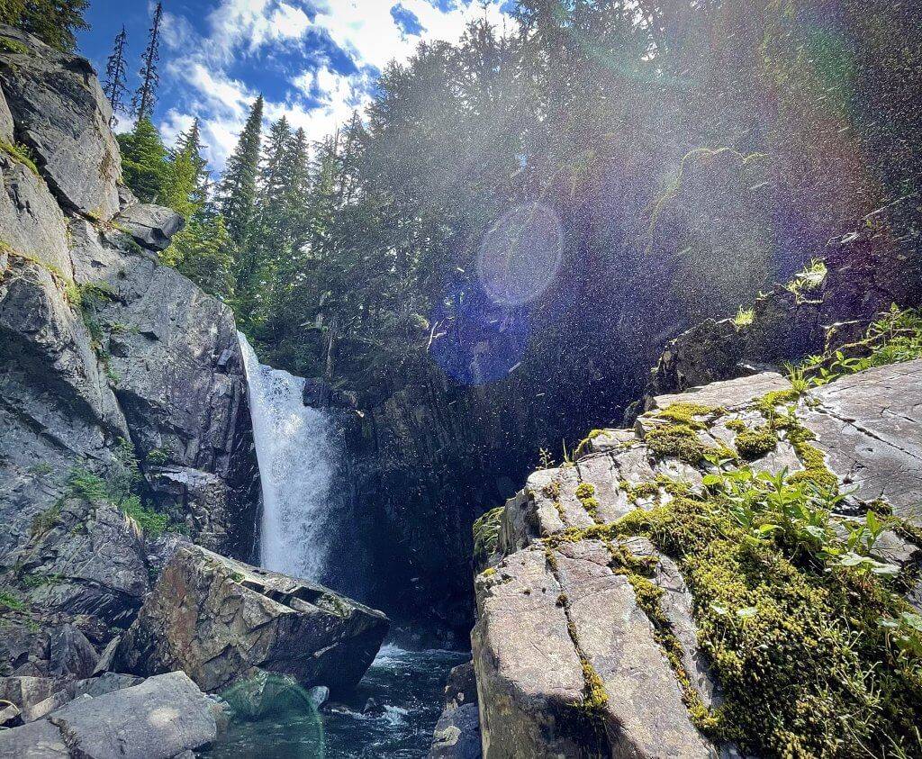 wide shot of Char Falls with jagged rocks surrounding the waterfall