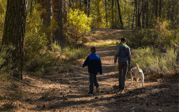 A family hiking at Charcoal Gulch.