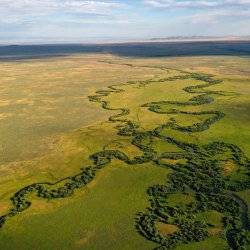 Aerial view of creek and prairie land south of Kilgore, Idaho.