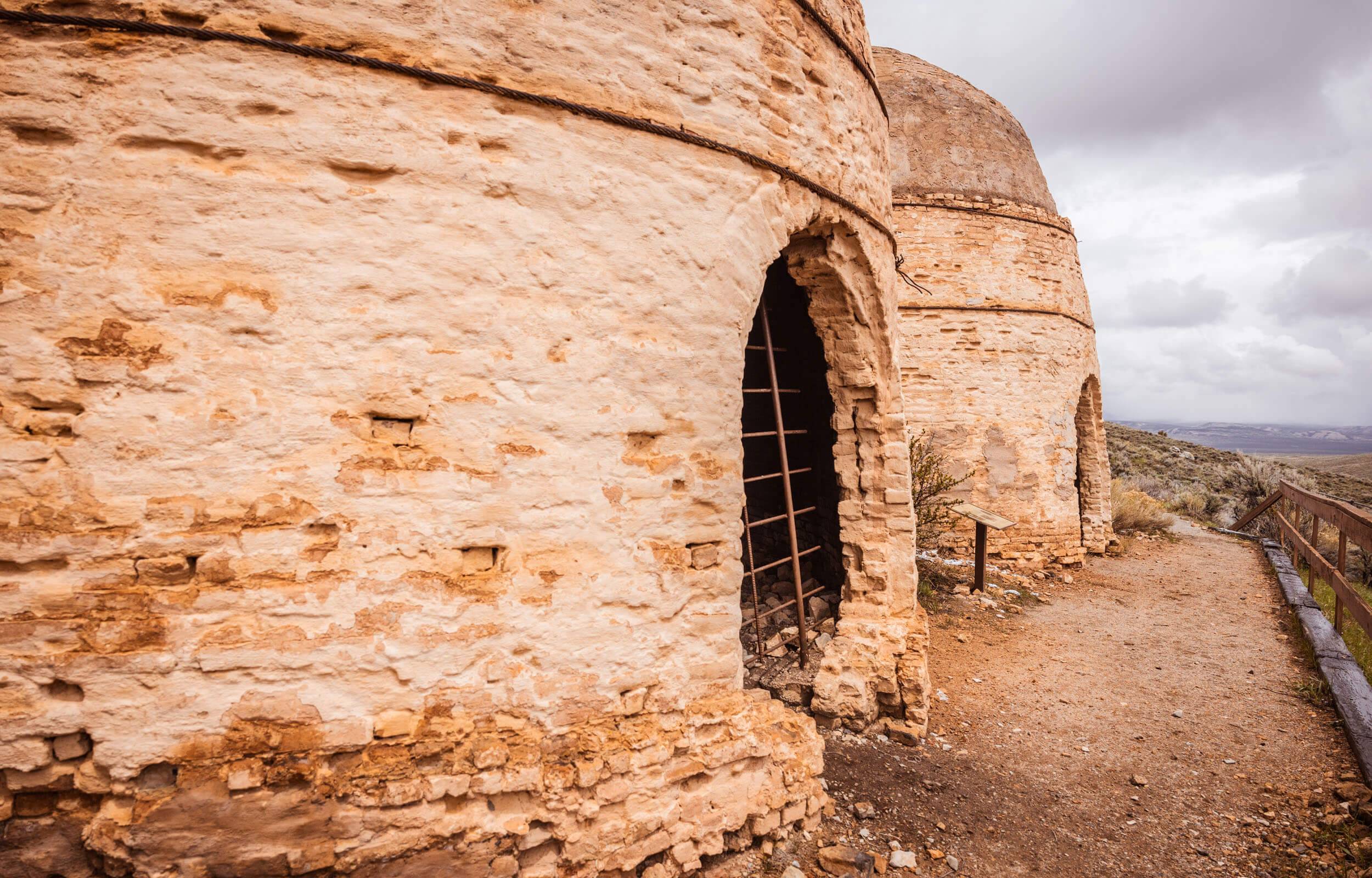 Closeup of two stone charcoal kilns at the Charcoal Kilns Interpretive Site.