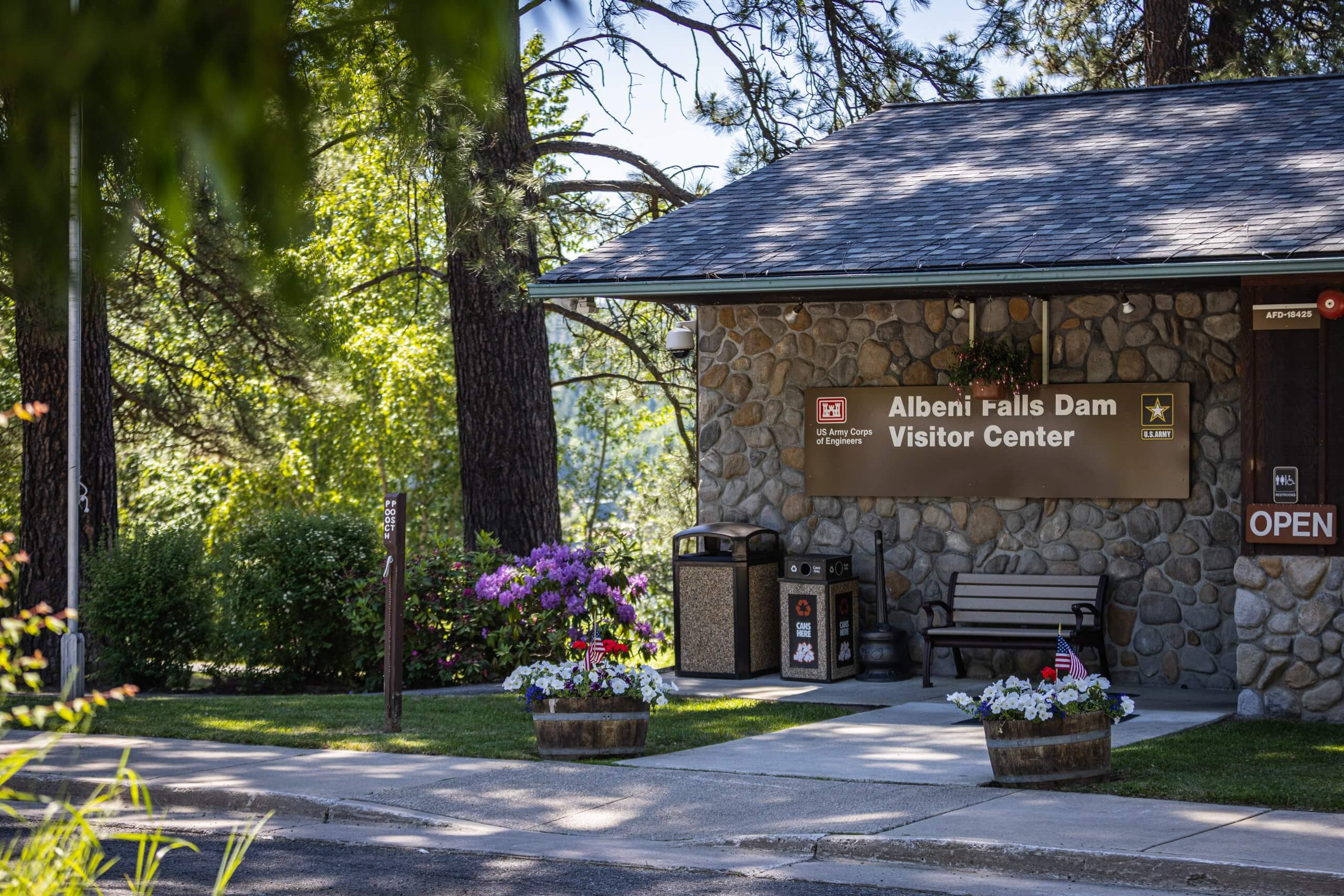 Exterior of a stone visitors center at Albeni Falls Dam.