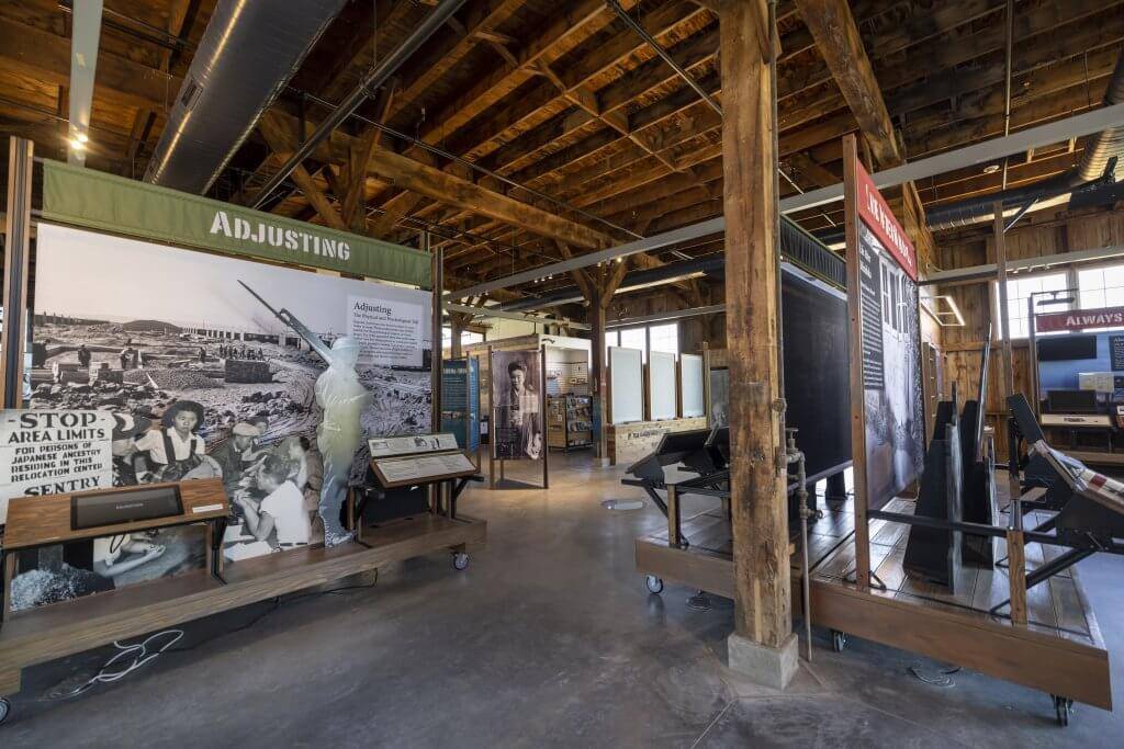 An indoor historical exhibit that displays information about Minidoka Historic Site.