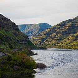 The Northwest Passage Scenic Byway winding along the Snake River in Hells Canyon at Hells Gate State Park.