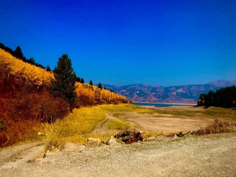 A scenic shot of McCoy Creek in the Palisades Reservoir during the fall season. 