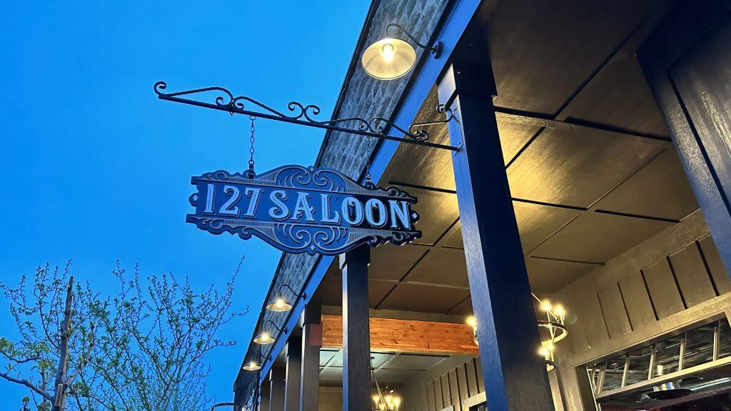 Sign for 127 Saloon in Meridian