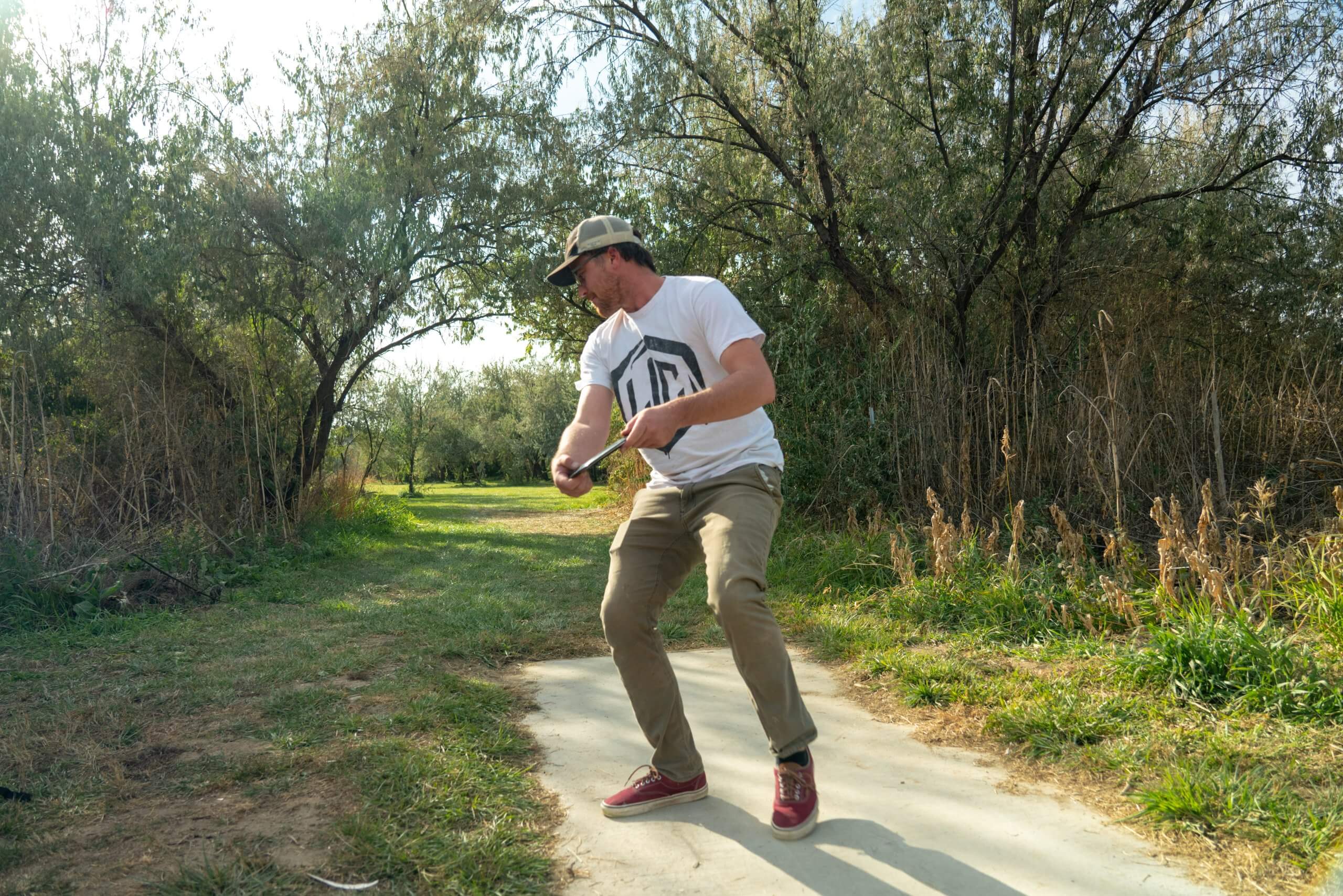 A visitor throws a frisbee at Eagle Island State Park.