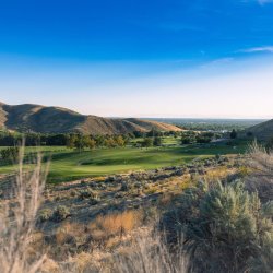 A view of the lush and scenic landscapes at Quail Hollow Golf Course.