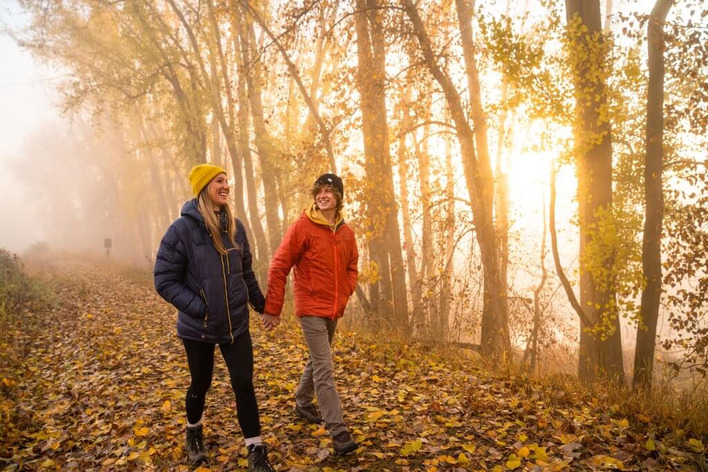 A couple walks on the Deep Creek Trail in the Kootenai Wildlife Refuge. 