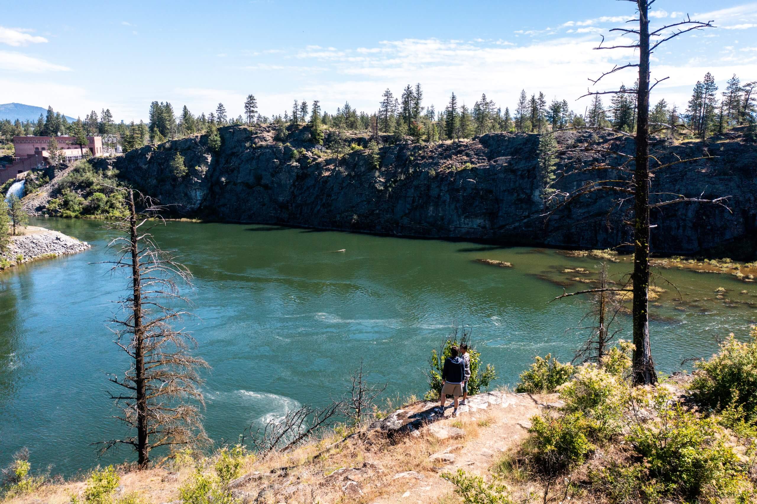 View of a body of water and trees along Old Wagon Trail in the Post Falls Community Forest.