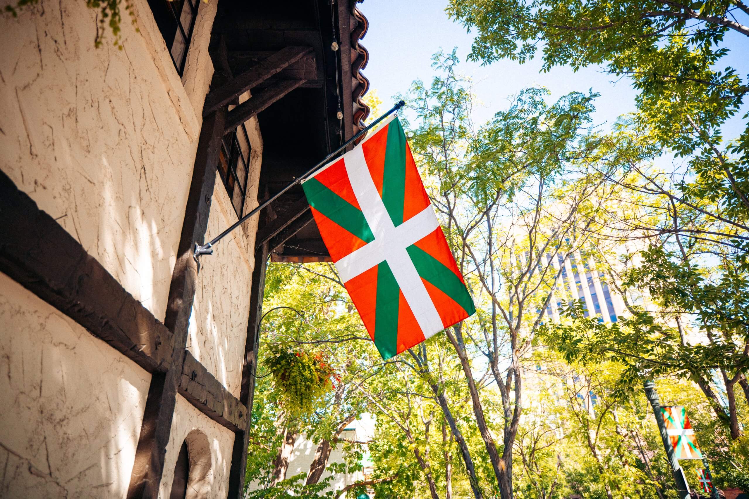 A Beginner's Guide to Jaialdi Festival Basque Flag flying outside